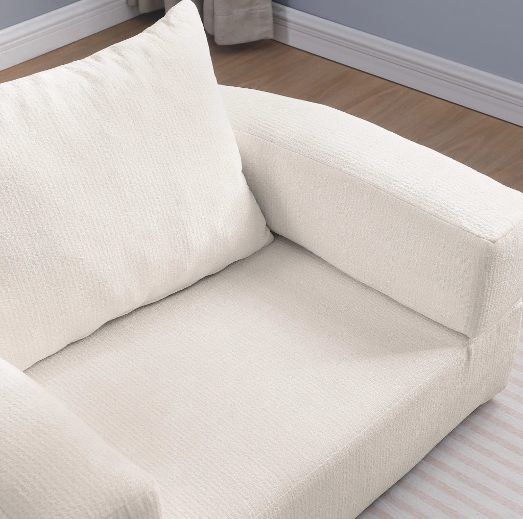 Divano modulare componibile beige in ciniglia con seduta ampia e confortevole per il soggiorno