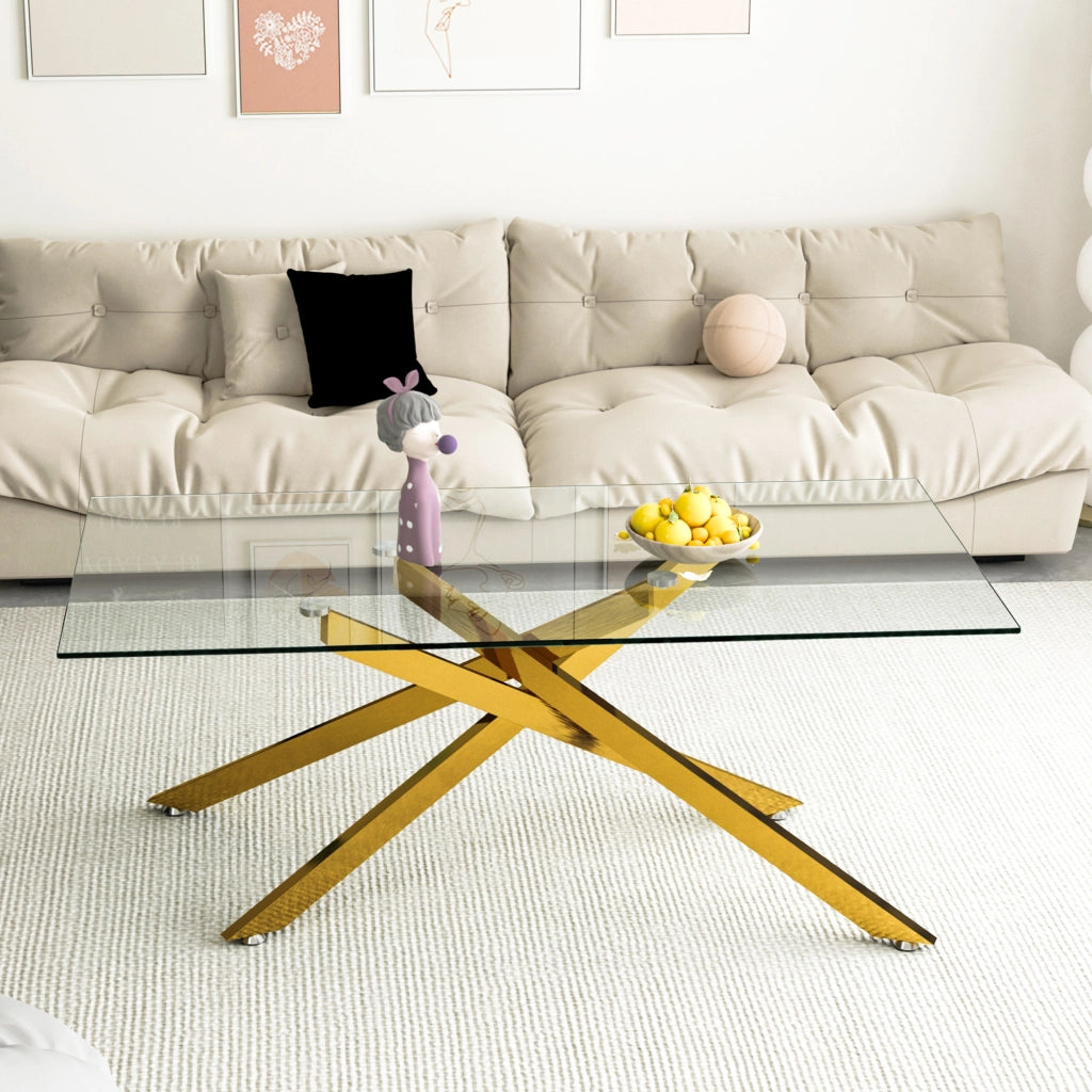 Tavolino basso fisso con piano in vetro temprato e struttura metallica dorata a croce per soggiorno e lounge