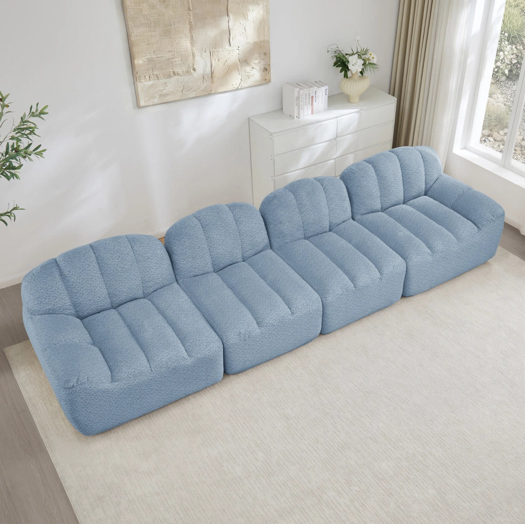 Divano modulare angolare senza struttura con forma ergonomica in pile granulato blu
