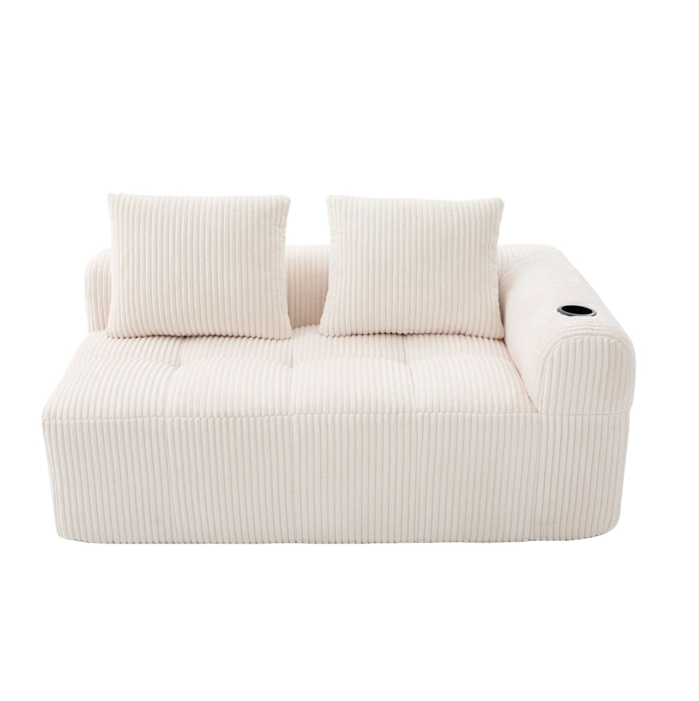Divano compatto beige in velluto a coste con portabicchieri