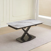 Tavolo allungabile Moritz con piano in ceramica effetto marmo bianco e gambe in titanio lucido 165x90x76H