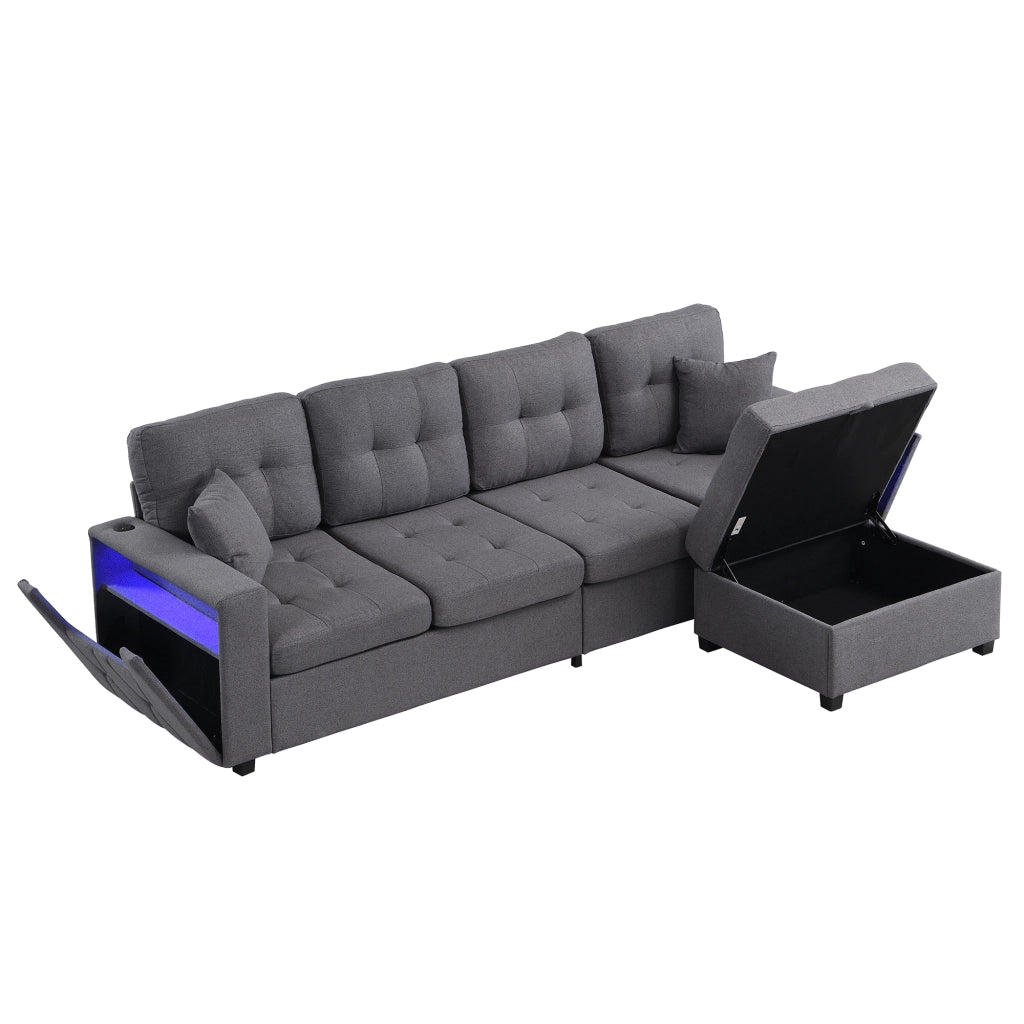 Divano ad angolo modulare in L 253x144;5x80;7 cm; divano con pouf portabagagli estraibile; braccioli; prese di ricarica; LED; lino; grigio
