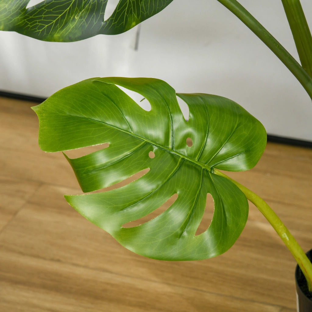 Pianta artificiale monstera da interno e esterno con 11 foglie realistiche vaso nero e base in cemento alta 110 cm