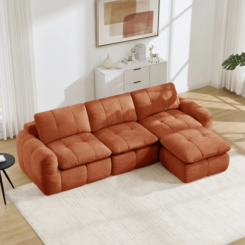 Divano angolare modulare a 3 posti in chenille arancione con pouf e struttura senza telaio per soggiorno