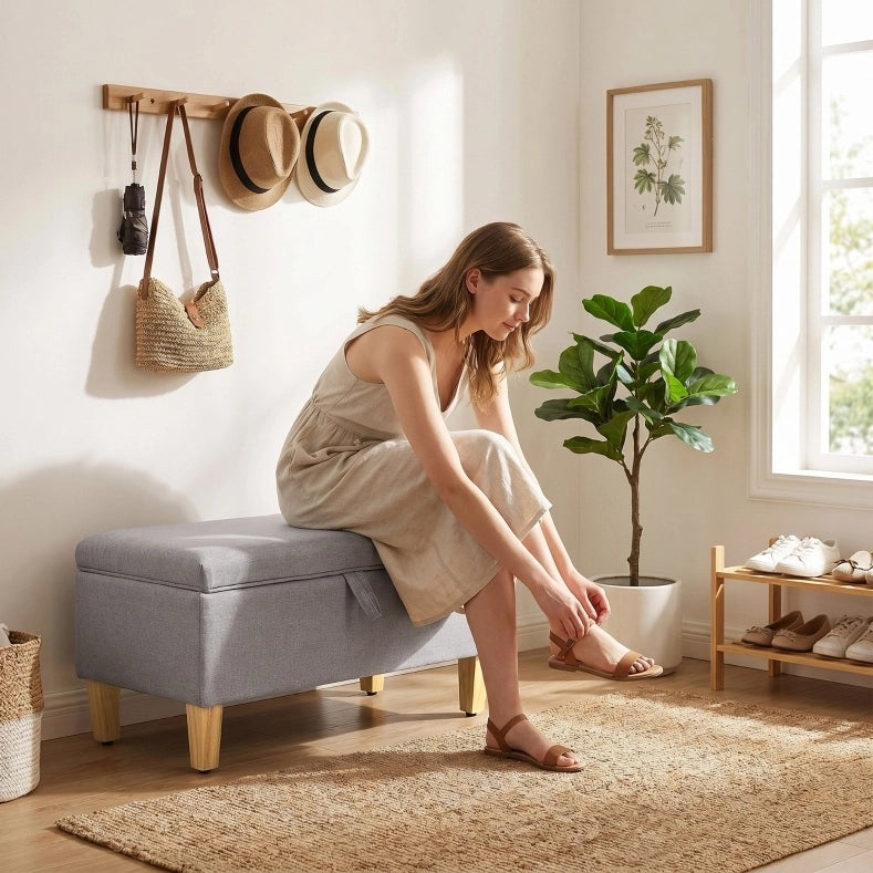 Panca contenitore imbottita in tessuto effetto lino grigio chiaro con gambe in legno di gomma