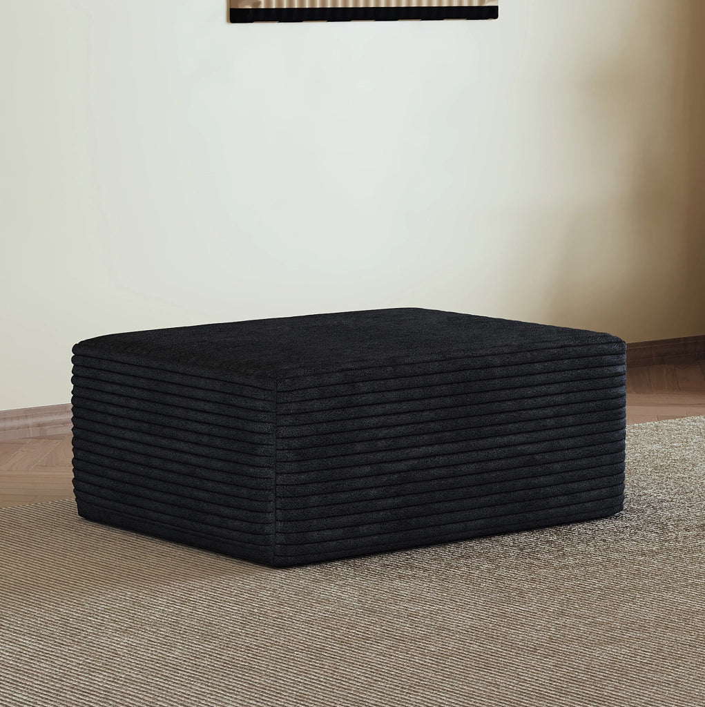Pouf imbottito senza montaggio in tessuto nero