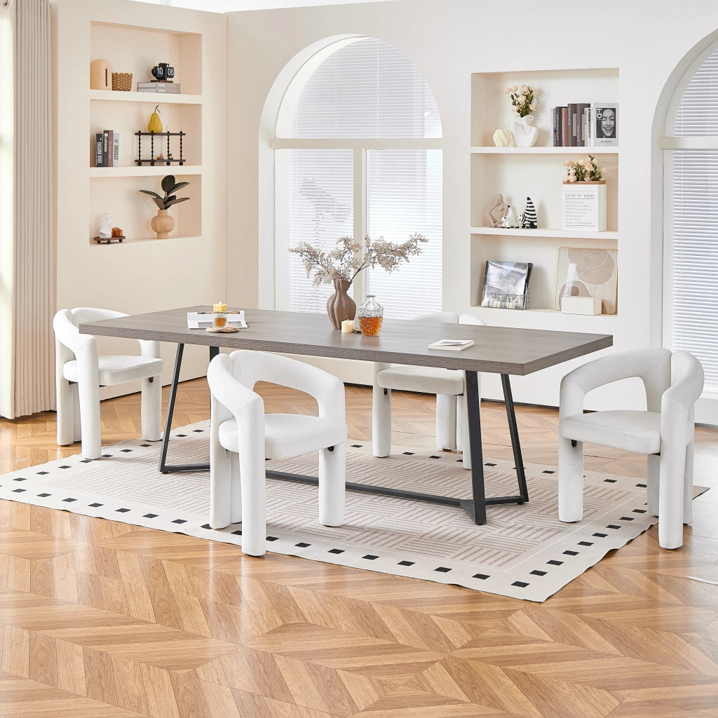 Sedia da pranzo con braccioli ergonomici e schienale avvolgente in velluto beige