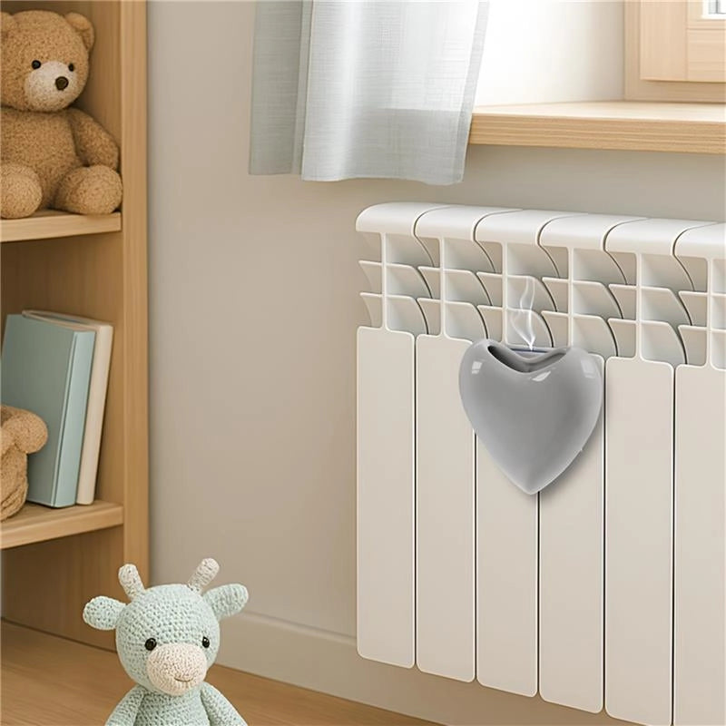 SET 3PZ VASO UMIDIFICATORE A CUORE SET 3 PZ IN CERAMICA DIMENSIONI 16X4X16CM - 15.5C COLORE ASSORTITO