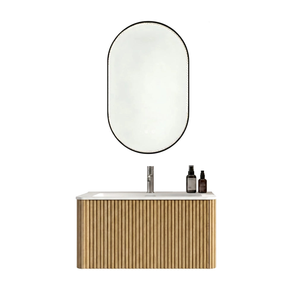Set di mobili con lavamani sospeso con specchio LED regolabile; lavabo integrato in solid surface e finitura rovere