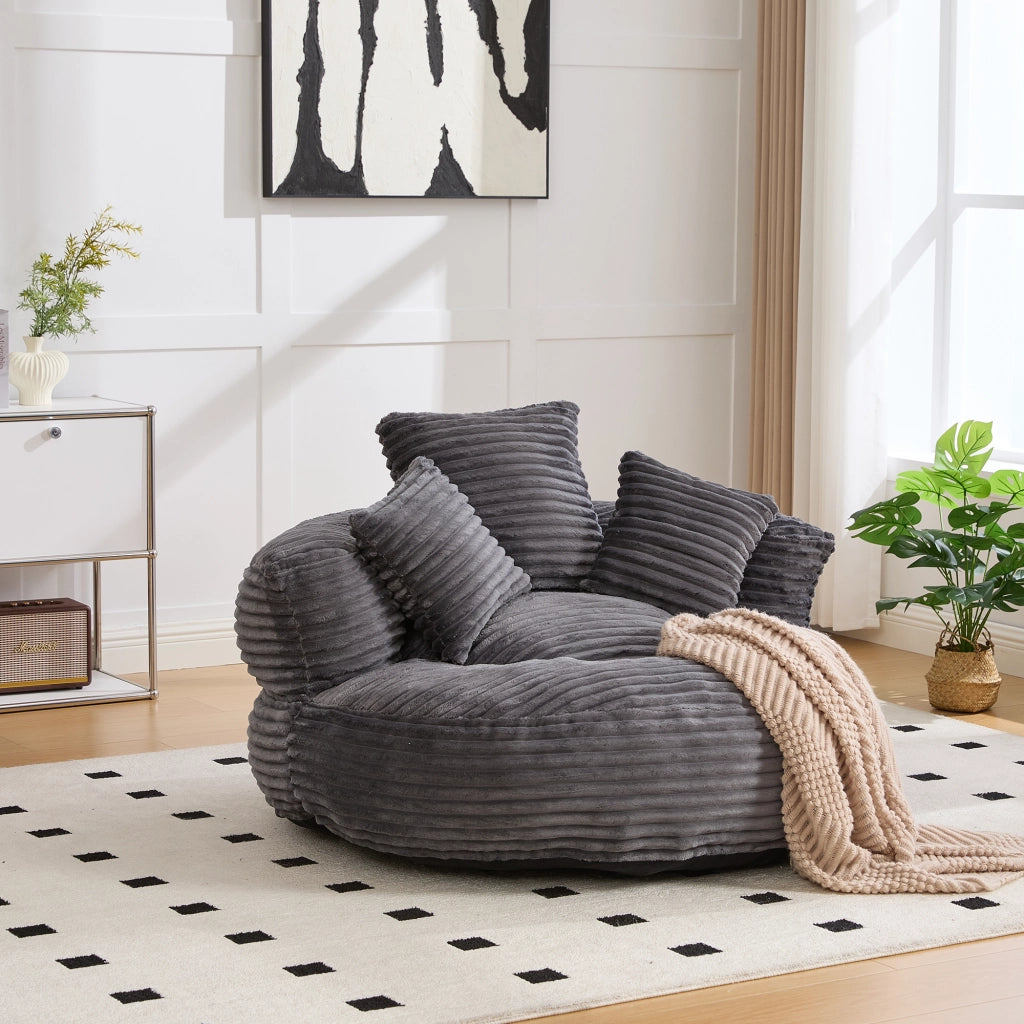 Poltrona sacco in velluto a coste grigio scuro con schienale alto; 108x108x52 cm