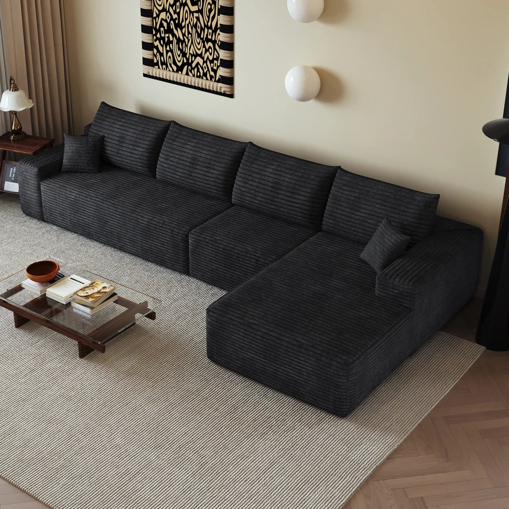 Divano angolare modulare con chaise longue e seduta profonda, senza montaggio, in tessuto a coste nero