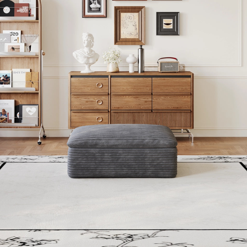 Divano modulare in tessuto grigio scuro con supporto interamente in schiuma e tecnologia di compressione