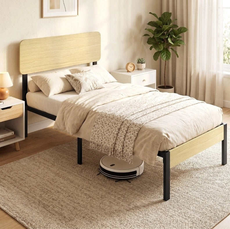 Letto singolo in metallo con testiera e spazio contenitore