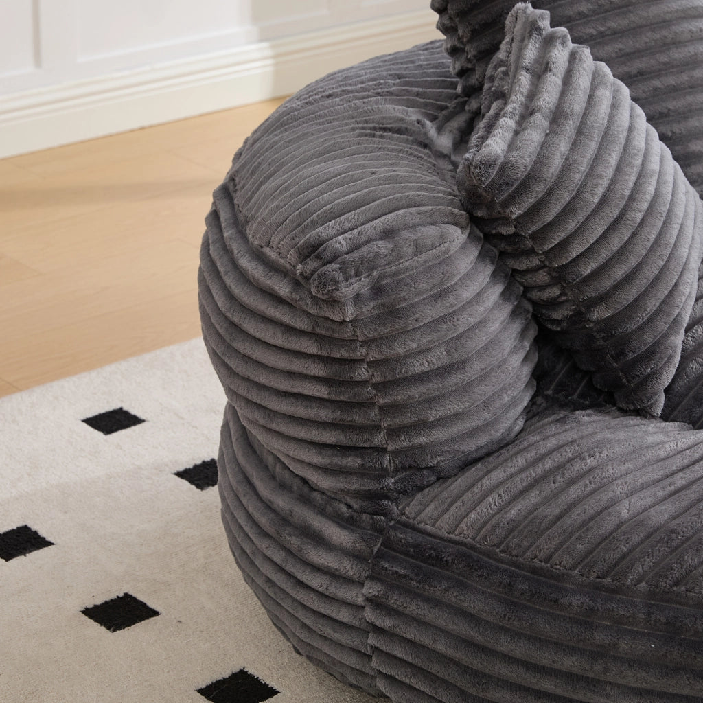 Poltrona sacco oversize in velluto a coste grigio scuro con schienale alto HOMVRA