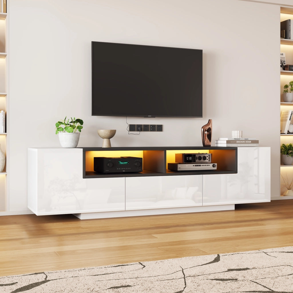 Mobile TV 180x40x48 cm, bianco lucido e nero, con LED, cassetti e design a L. Per TV fino a 75 pollici.