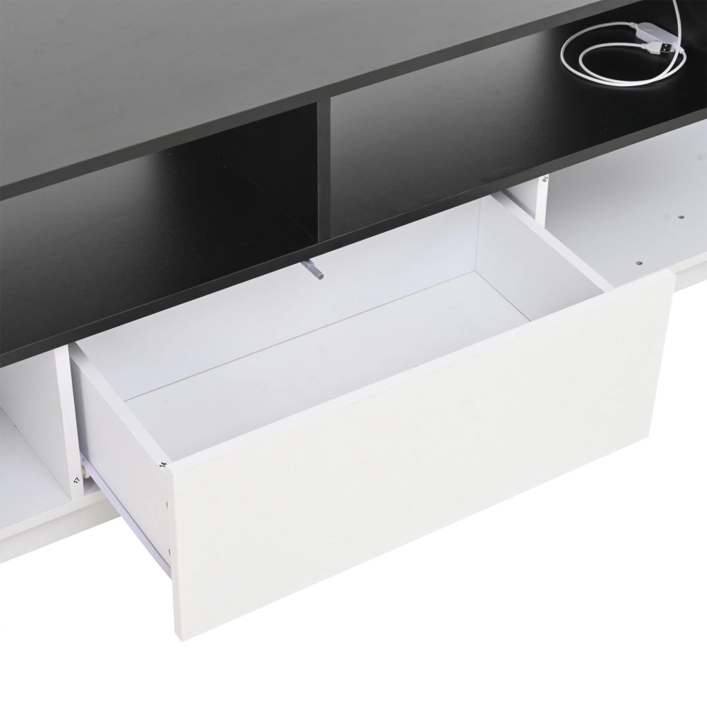 Mobile TV 180x40x48 cm, bianco lucido e nero, con LED, cassetti e design a L. Per TV fino a 75 pollici.