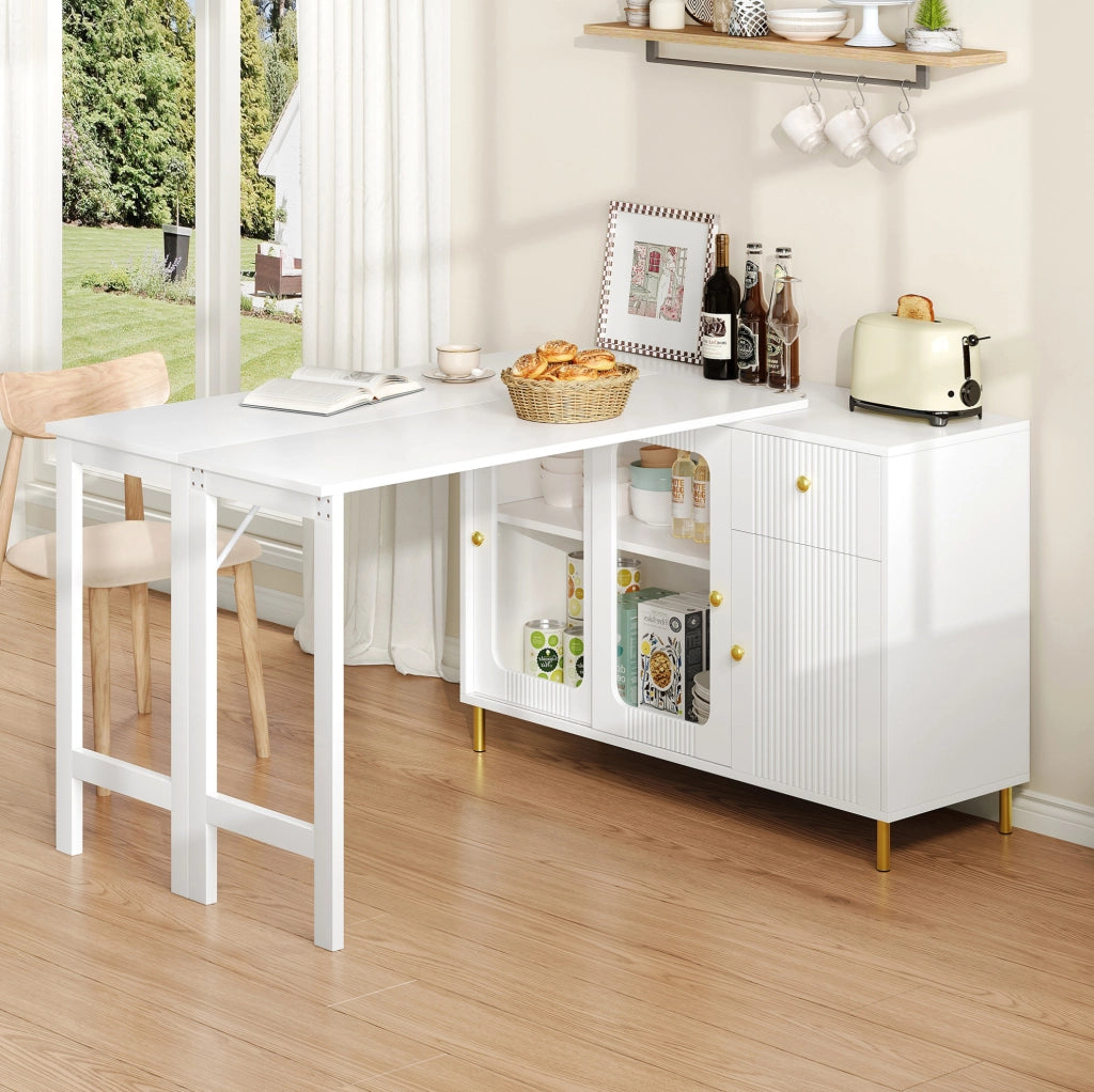 Buffet moderno bianco con tavolo estensibile e pieghevole, ante scorrevoli in vetro, gambe metalliche dorate e motivo ondulato, 116x40x78,5 cm