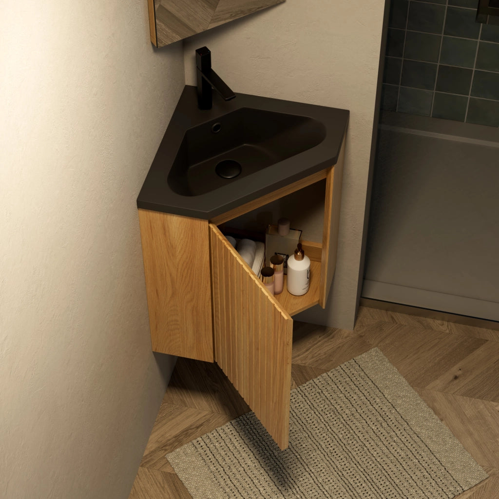 Mobile bagno angolare ULEVR con lavabo triangolare integrato in resina nera opaca e anta effetto rovere