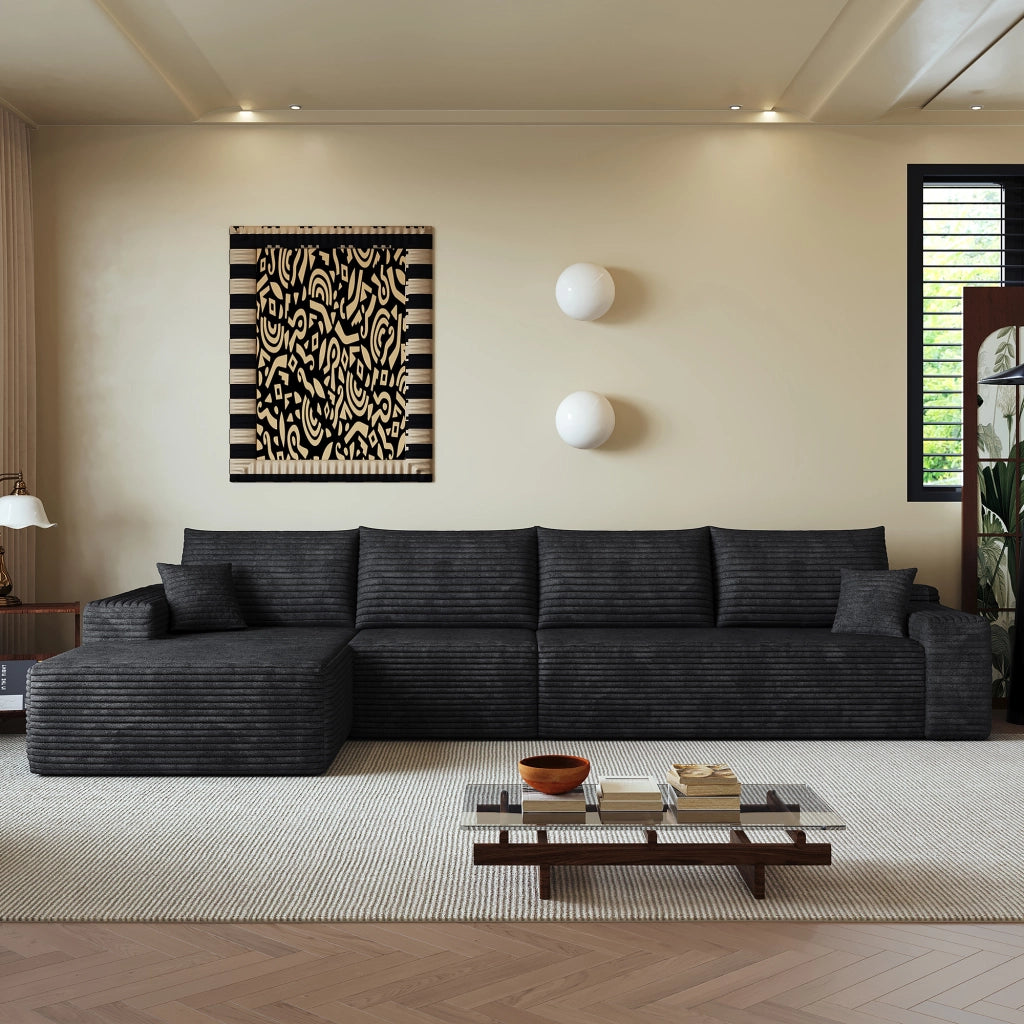 Divano 340x175x83 cm in tessuto nero a coste; imbottitura in schiuma elastica; senza attrezzi
