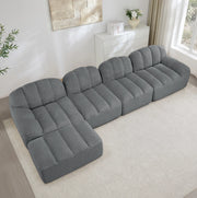 Divano modulare 4 posti con pouf, imbottitura in schiuma ad alta densità 32D, rivestimento in fleece grigio, ideale per soggiorno