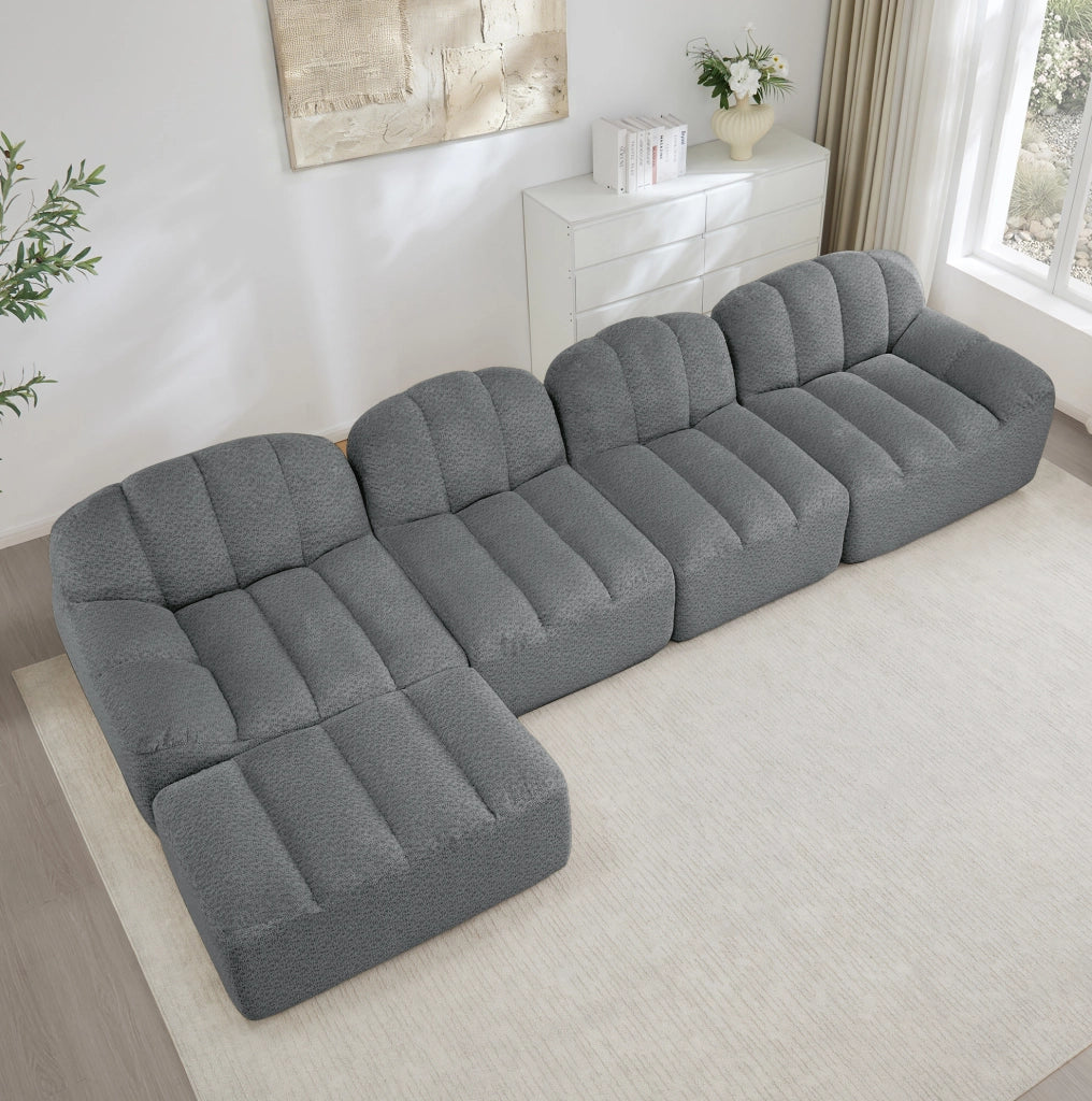 Divano modulare 4 posti con pouf, imbottitura in schiuma ad alta densità 32D, rivestimento in fleece grigio, ideale per soggiorno