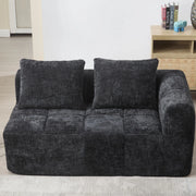 Divano comodo per 2 persone con chaise longue, tessuto chenille nero, cuscino incluso e tasche laterali per telecomando e cellulare