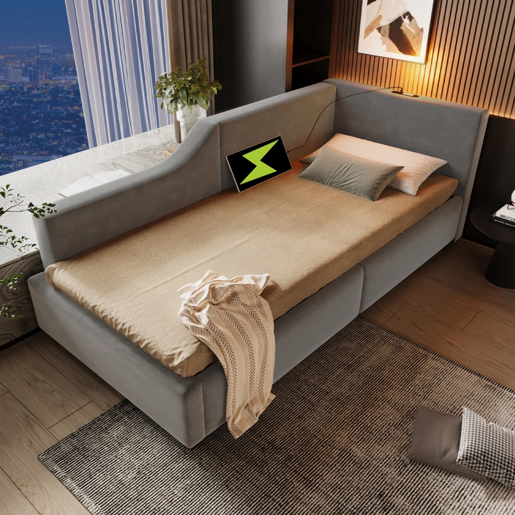 Letto contenitore 90 × 190 cm con rete rialzabile idraulica; velluto grigio; USB-C e luce da lettura