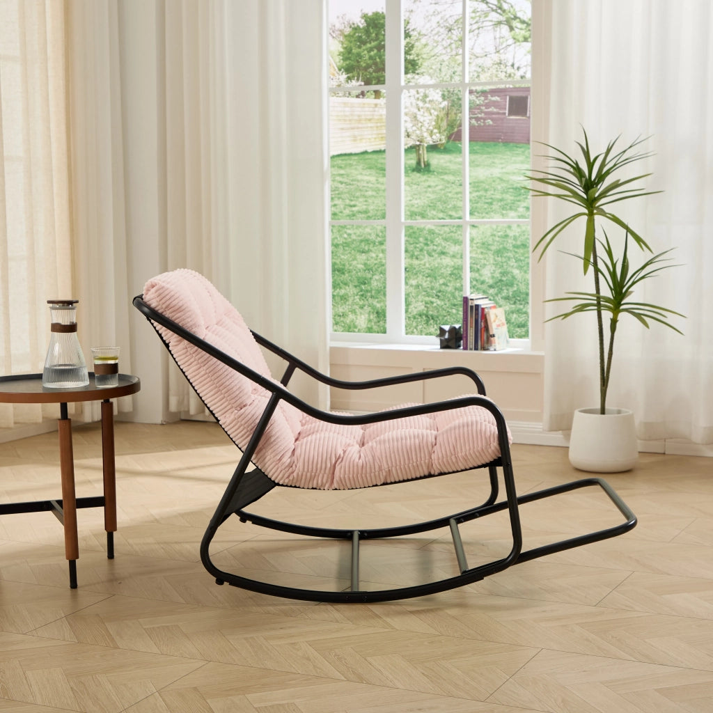 Sedia a dondolo da esterno, struttura nera con cuscino rosa spesso e morbido. Per soggiorno, camera da letto e sala lettura