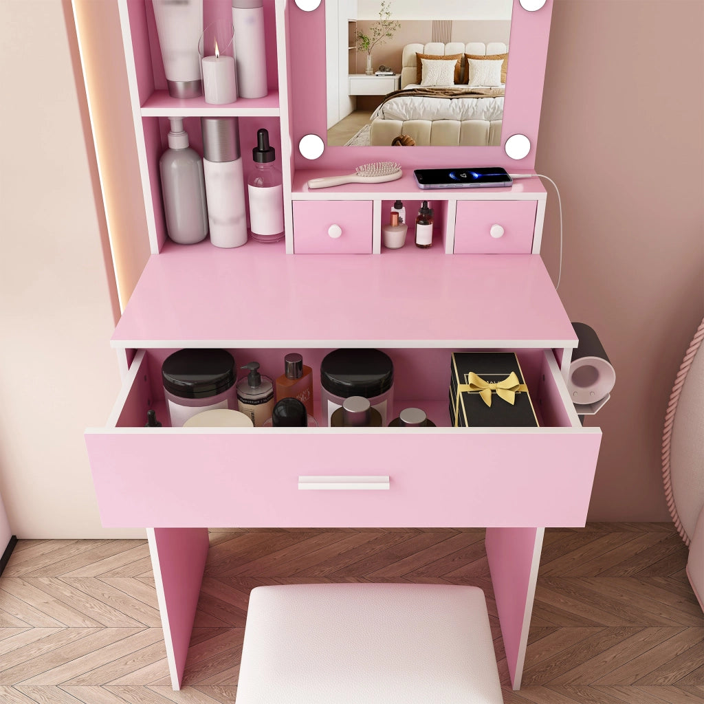 Toeletta rosa con specchio LED a 3 tonalità; presa integrata; supporto asciugacapelli; cassetti e sgabello imbottito in MDF