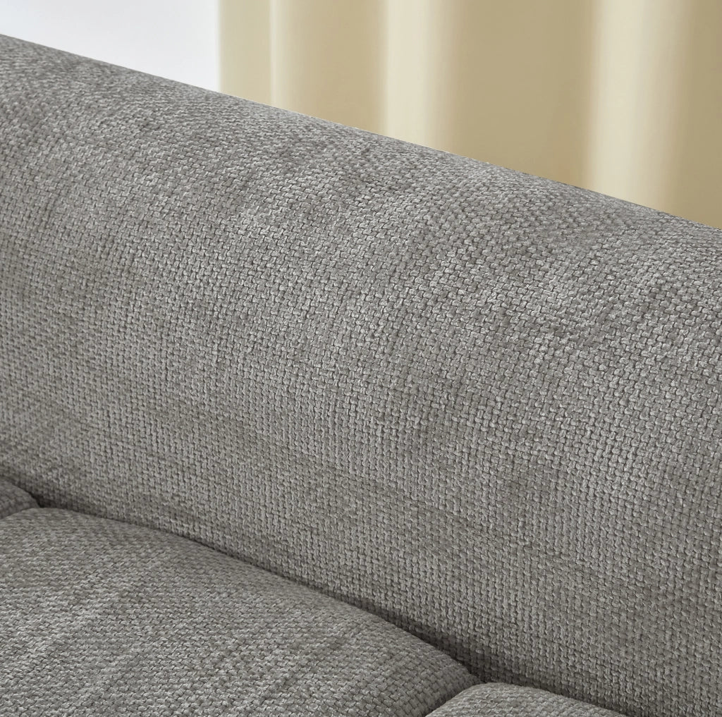 Divano angolare in tessuto chenille grigio chiaro 263 cm con schienale ergonomico e tasca laterale porta riviste