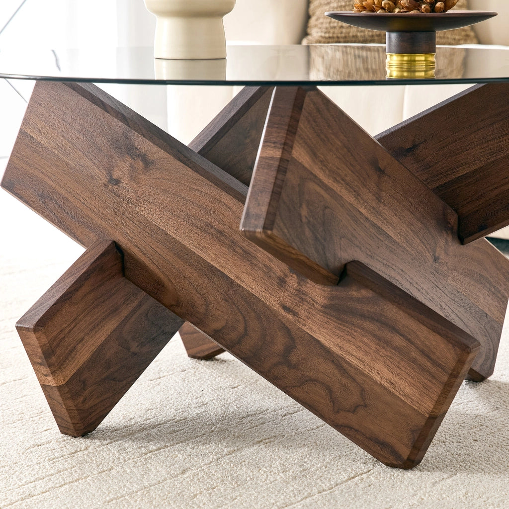 Tavolino basso fisso rotondo con piano in vetro temperato e base geometrica in MDF color noce