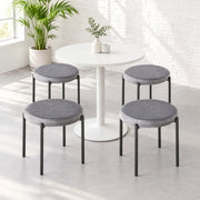 Set di 4 sgabelli impilabili con seduta imbottita e struttura in acciaio grigio scuro