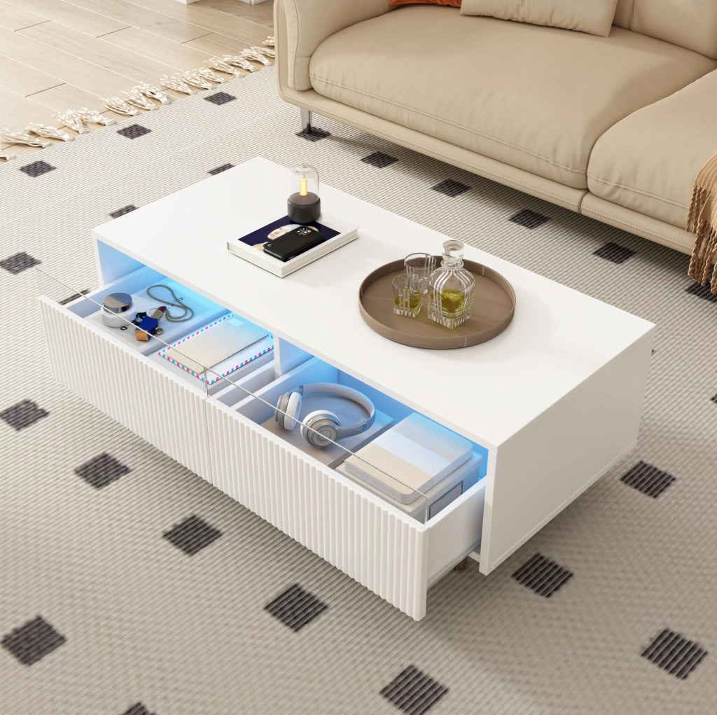 Tavolino da salotto moderno con illuminazione LED colorata, doppio cassetto e gambe in legno bianco e oro 110x50x40 cm
