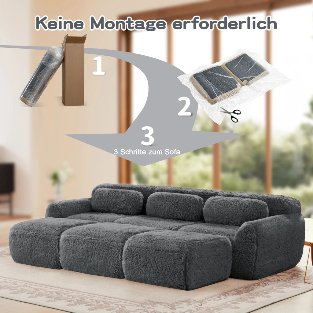 Divano modulare 3 posti in tessuto plush grigio con ottomana collegabile schienale curvo base antiscivolo