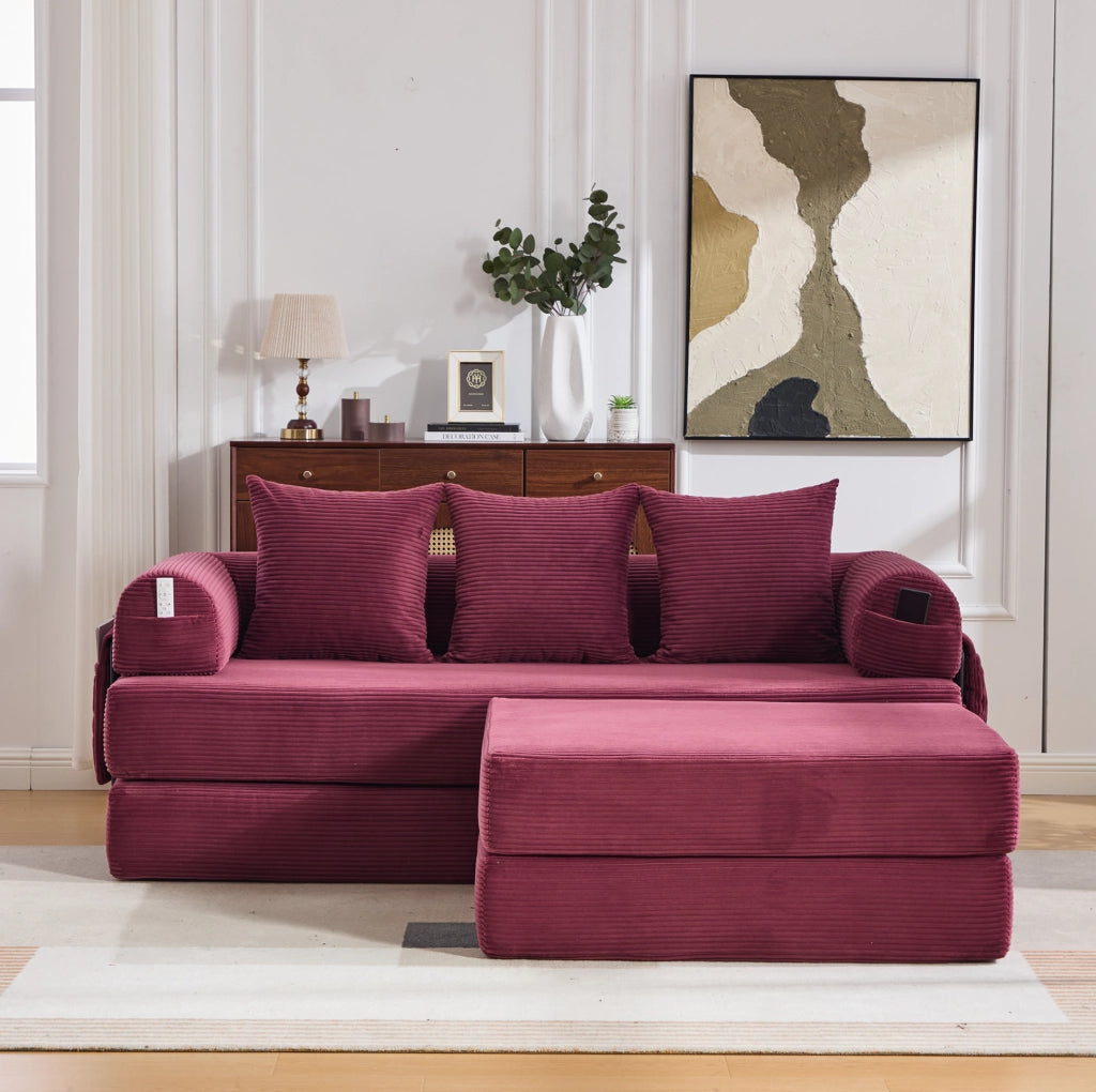 Divano modulare con pouf in velluto a coste; struttura in metallo e tasca laterale; rosso vino