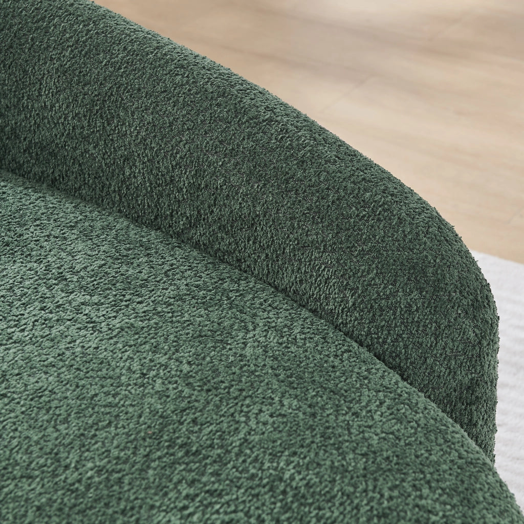 Divano compatto dal design arrotondato in tessuto teddy verde con poggiatesta
