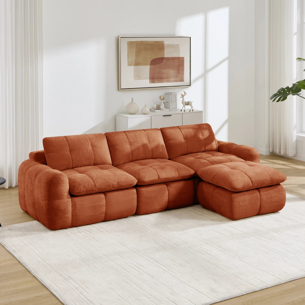 Divano angolare modulare a 3 posti in chenille arancione con pouf e struttura senza telaio per soggiorno