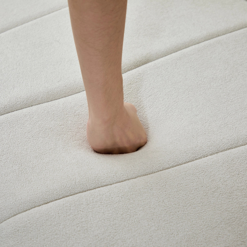 Divano modulare curvo in chenille beige con 2 cuscini