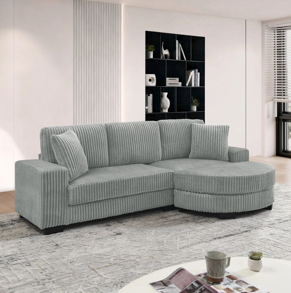 Divano angolare ULEVR 256,5x133,5x89 cm con pouf ovale reversibile, 2 cuscini, velluto a coste grigio