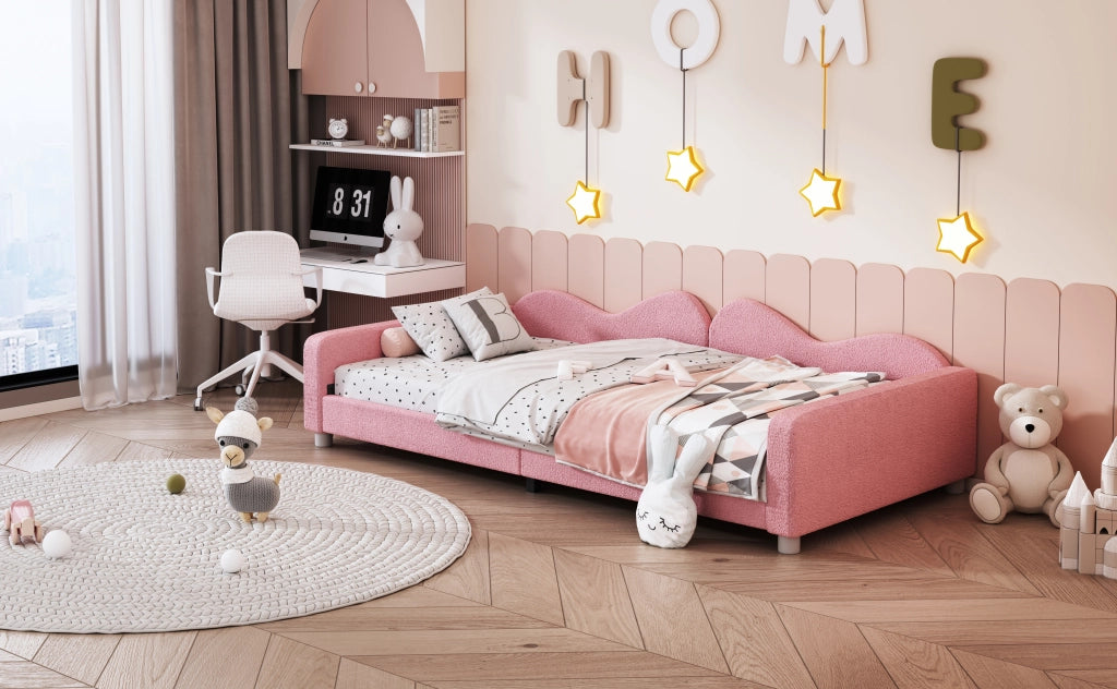 Letto per bambini imbottito rosa con schienale e braccioli struttura a doghe in legno portata 120 kg