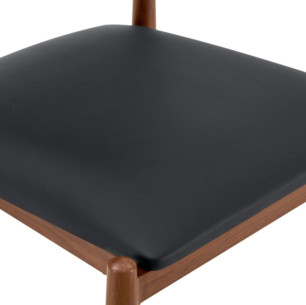 Set 2 sedie da pranzo in PU nero con gambe in metallo HOMVRA