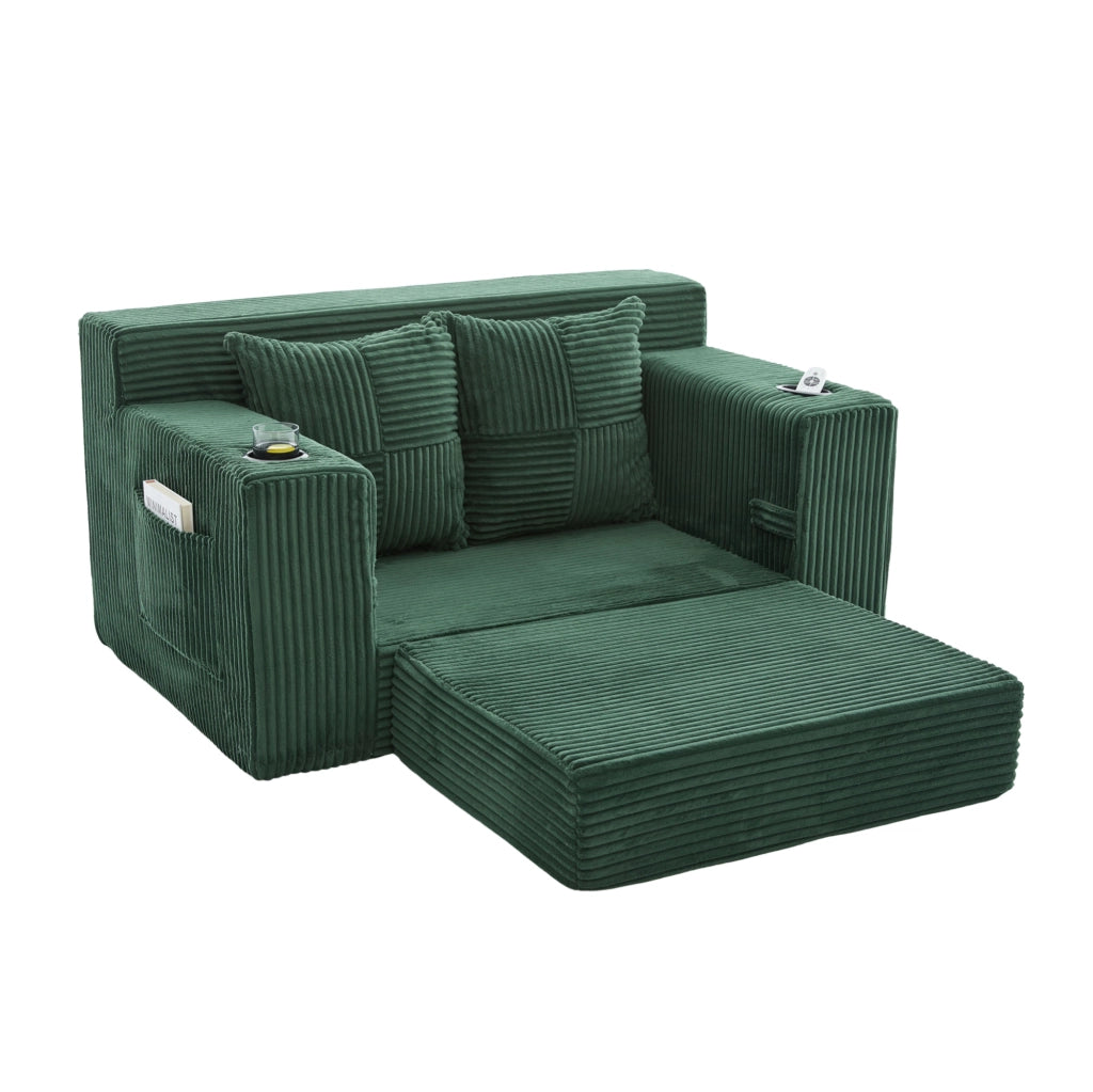 Divano pouf ULEVR 151x133x64 cm in velluto a coste verde smeraldo con 2 cuscini e tasche laterali