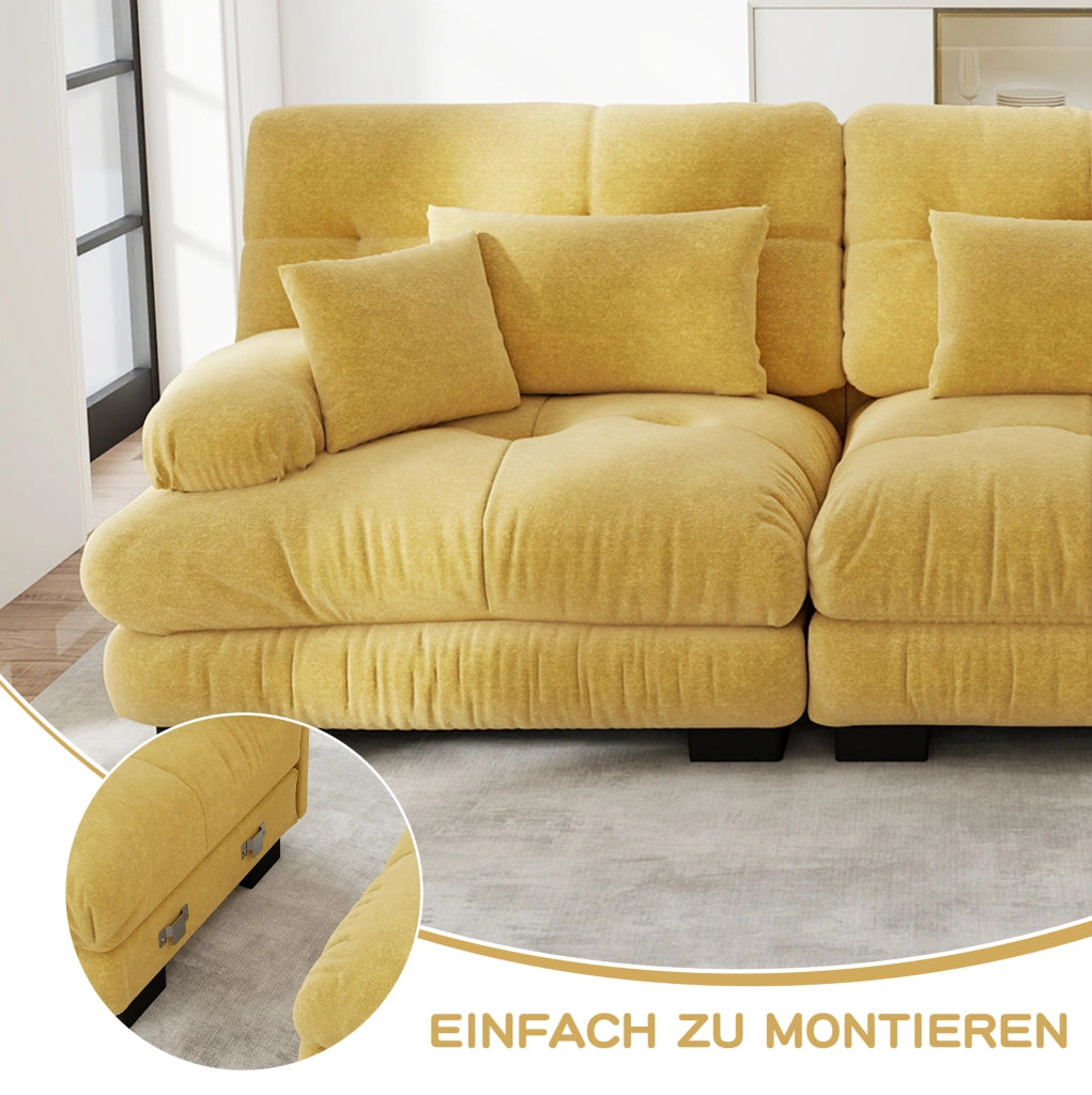 Divano modulare in chenille gialla con seduta profonda e cuscini; stile cloud