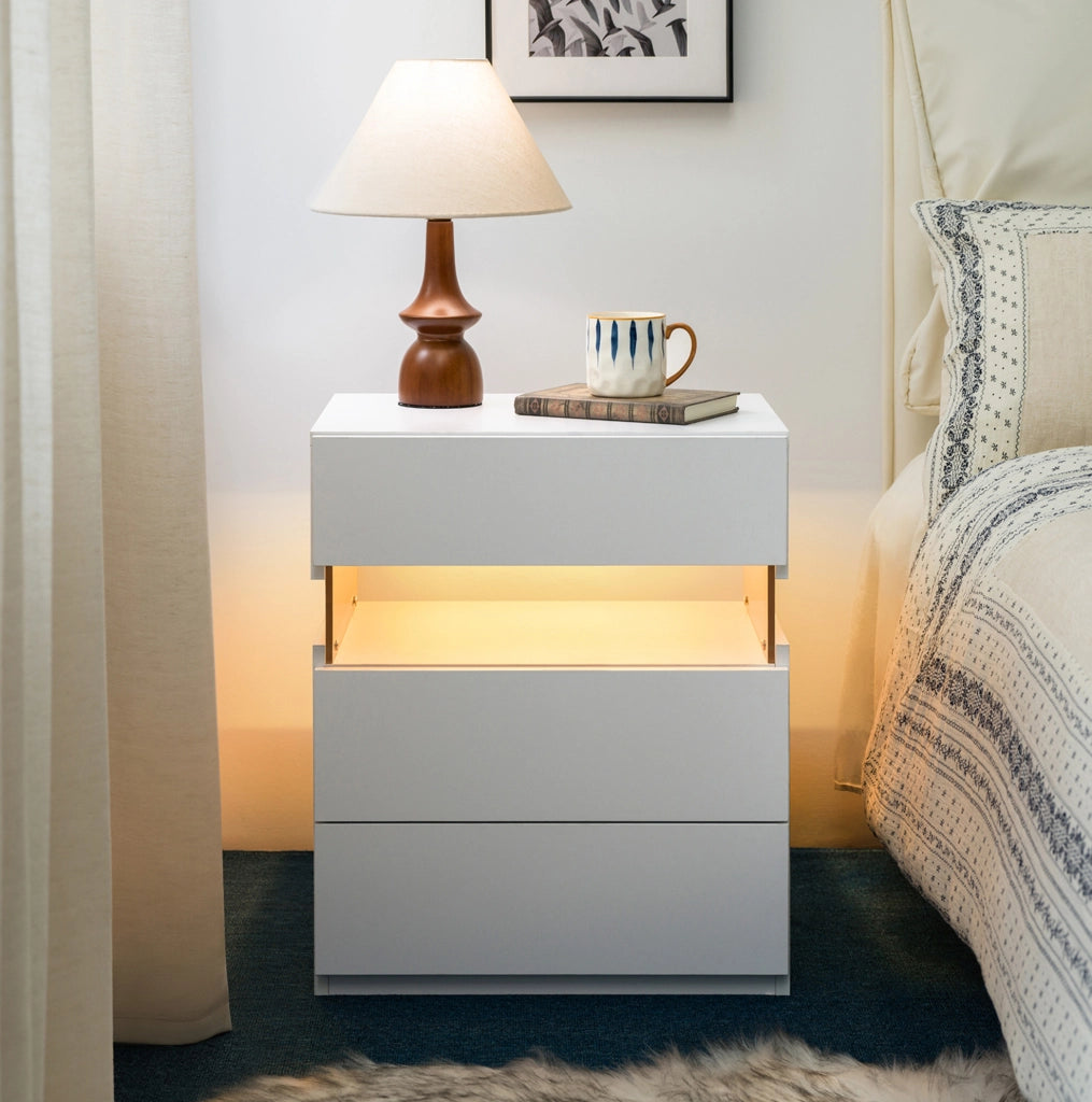 Comodino LED bianco con pannello acrilico e 3 cassetti in legno ingegnerizzato