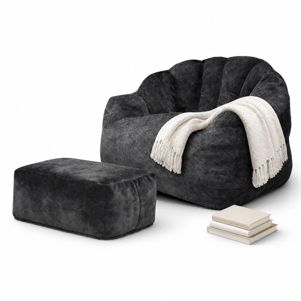 Poltrona relax a petalo nera con pouf in flanella