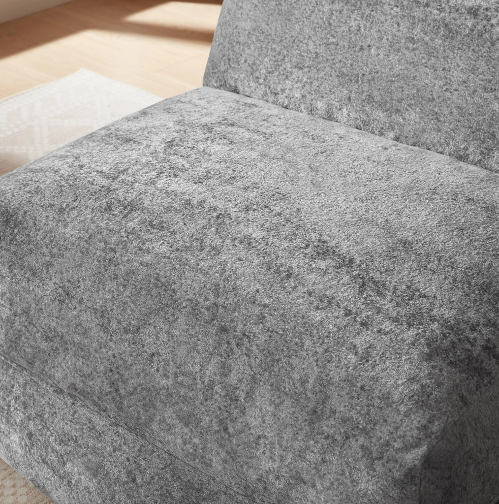 Poltrona ULEVR grigia in schiuma, seduta singola dal design moderno per soggiorno e camera da letto