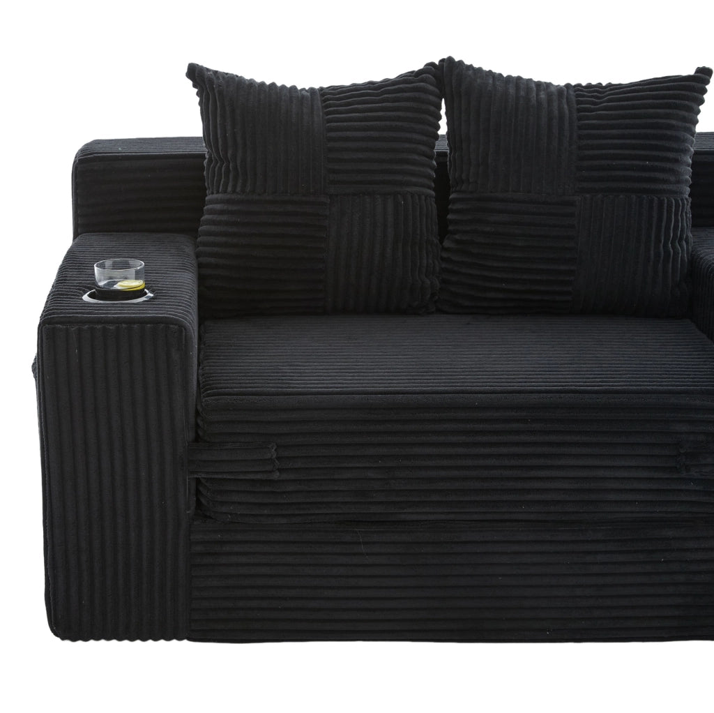 Divano pouf in velluto a coste nero 151x133 cm con tasche laterali e 2 cuscini HOMVRA