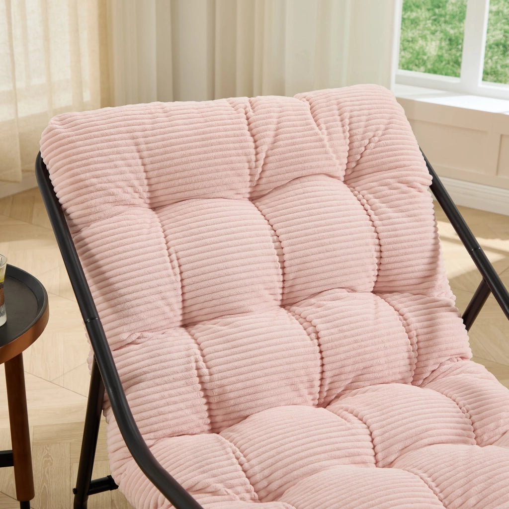 Sedia a dondolo da esterno, struttura nera con cuscino rosa spesso e morbido. Per soggiorno, camera da letto e sala lettura