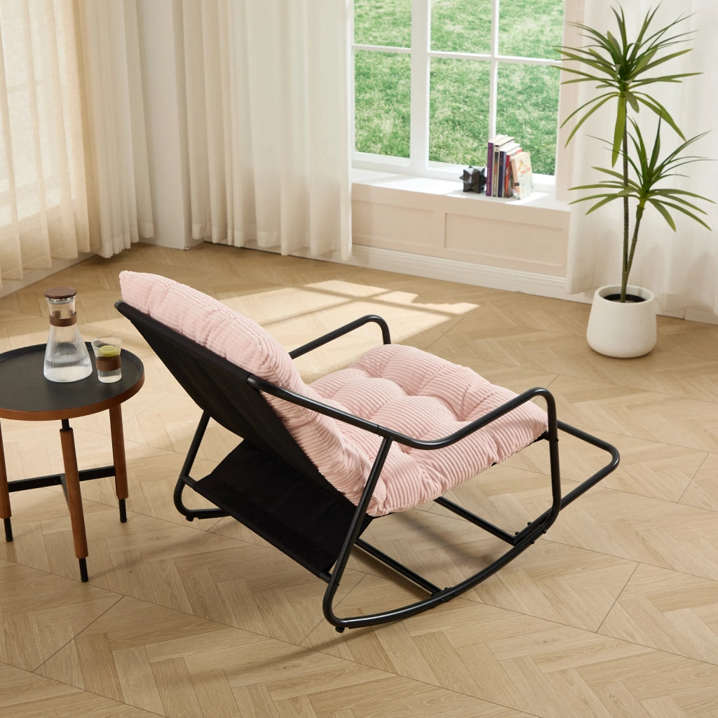 Sedia a dondolo da esterno, struttura nera con cuscino rosa spesso e morbido. Per soggiorno, camera da letto e sala lettura