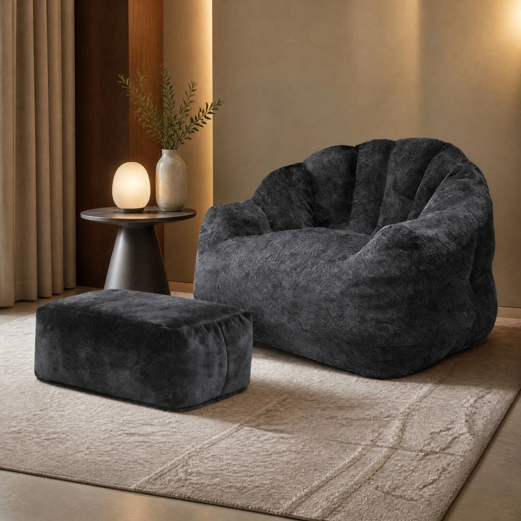 Poltrona relax a petalo nera con pouf in flanella